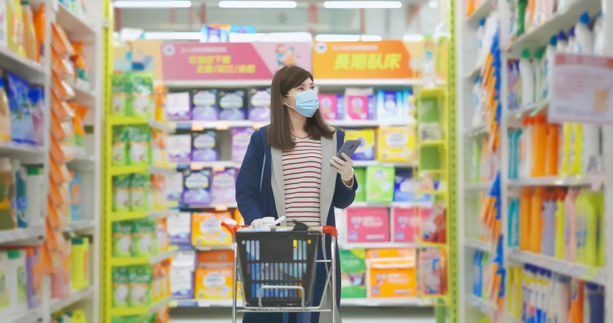 Woman Buying Goods in the Supermarket
